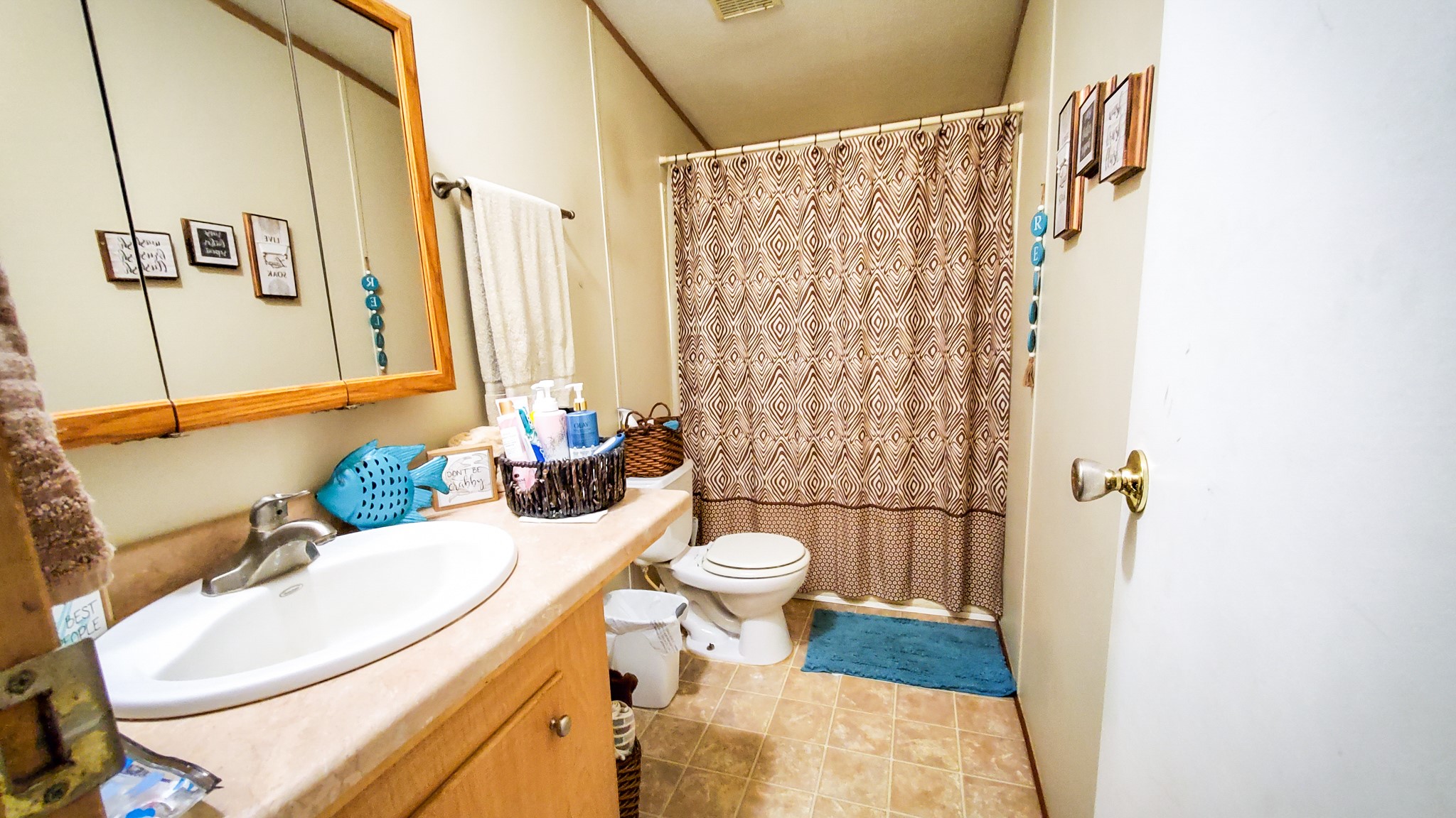 40902 Highway 105 Batson, TX 77519 - Photo 35 of 50 a bathroom with a sink toilet and shower