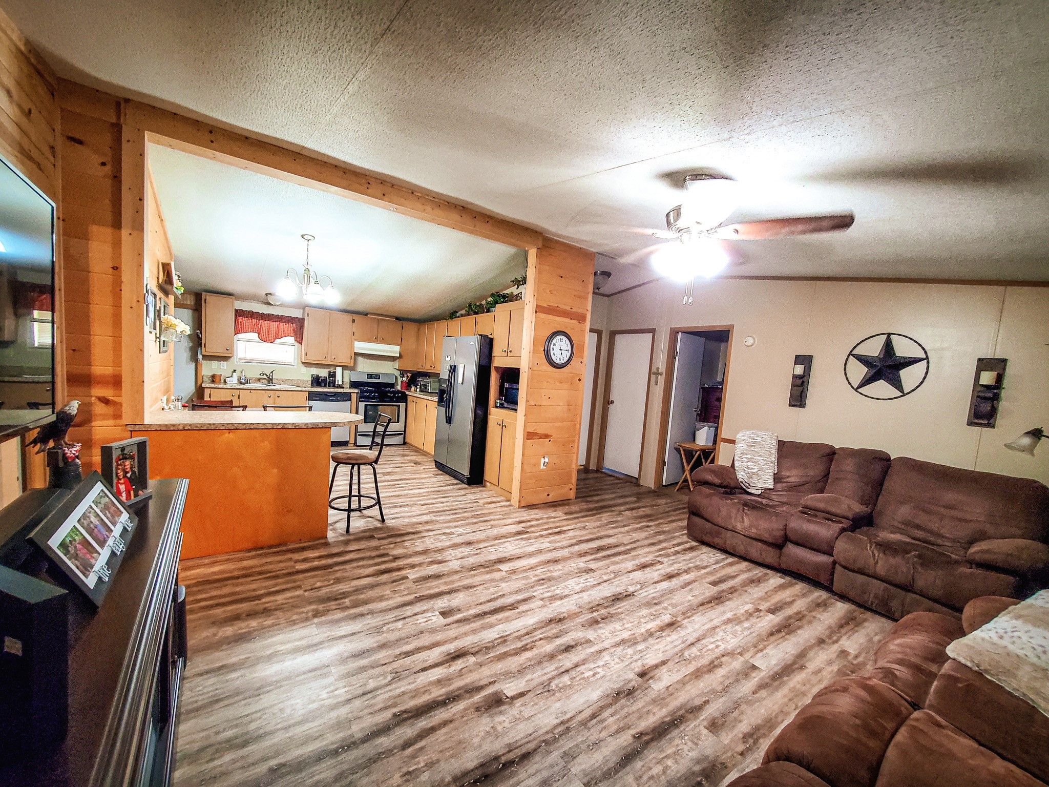 40902 Highway 105 Batson, TX 77519 - Photo 37 of 50 a living room with furniture and kitchen view