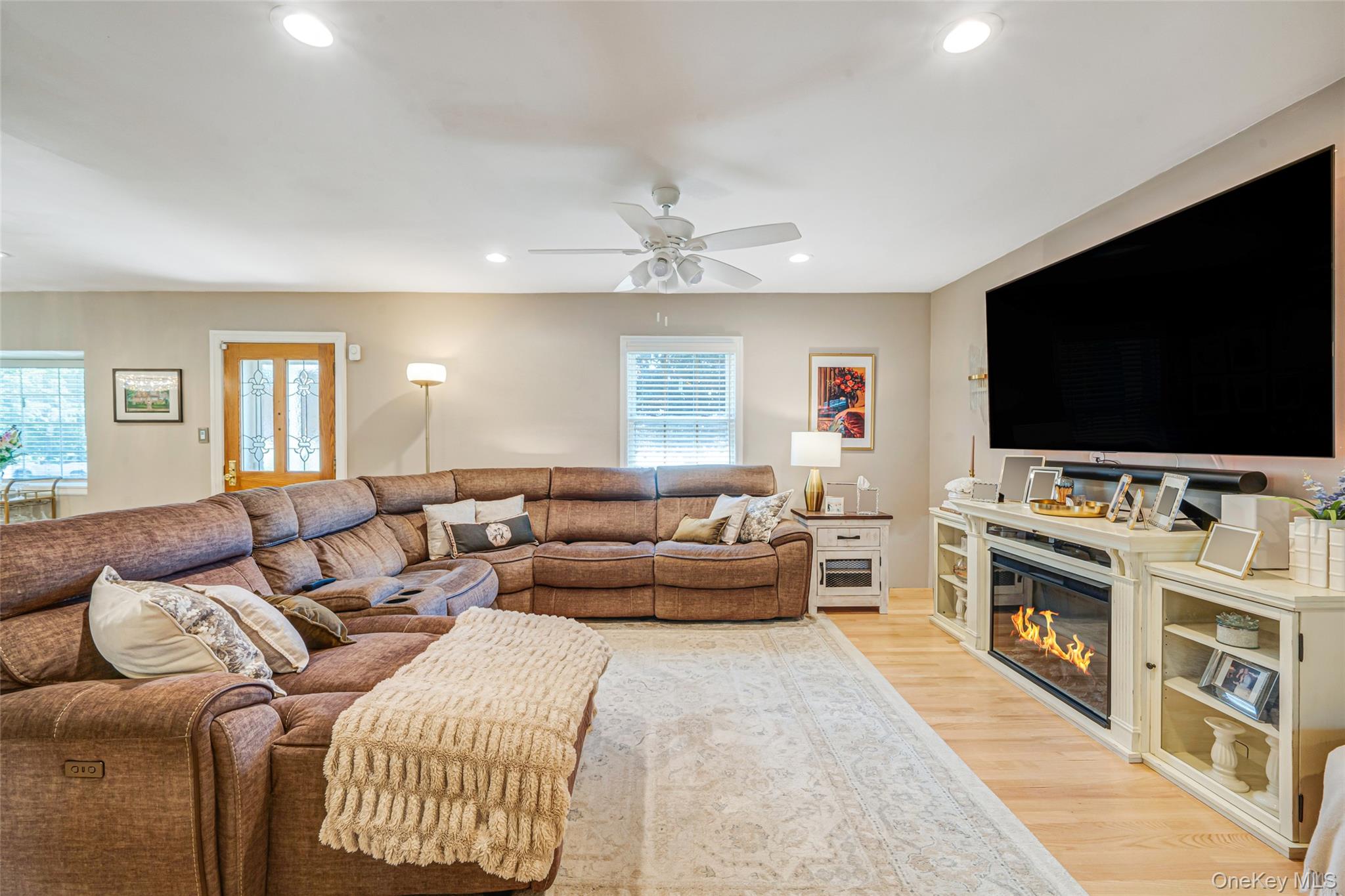 389 Yale Road Franklin Square, NY 11010 - Photo 12 of 43 a living room with furniture and a flat screen tv