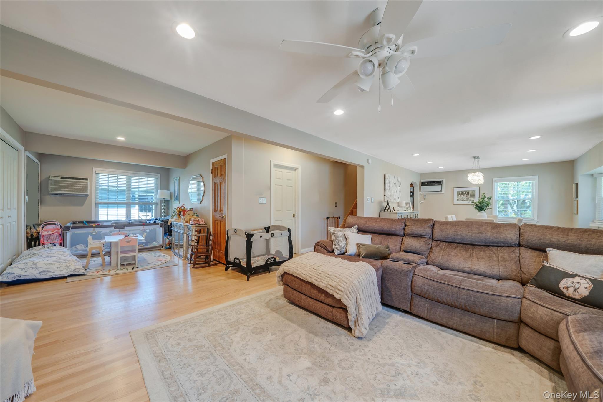 389 Yale Road Franklin Square, NY 11010 - Photo 13 of 43 a living room with furniture and wooden floor