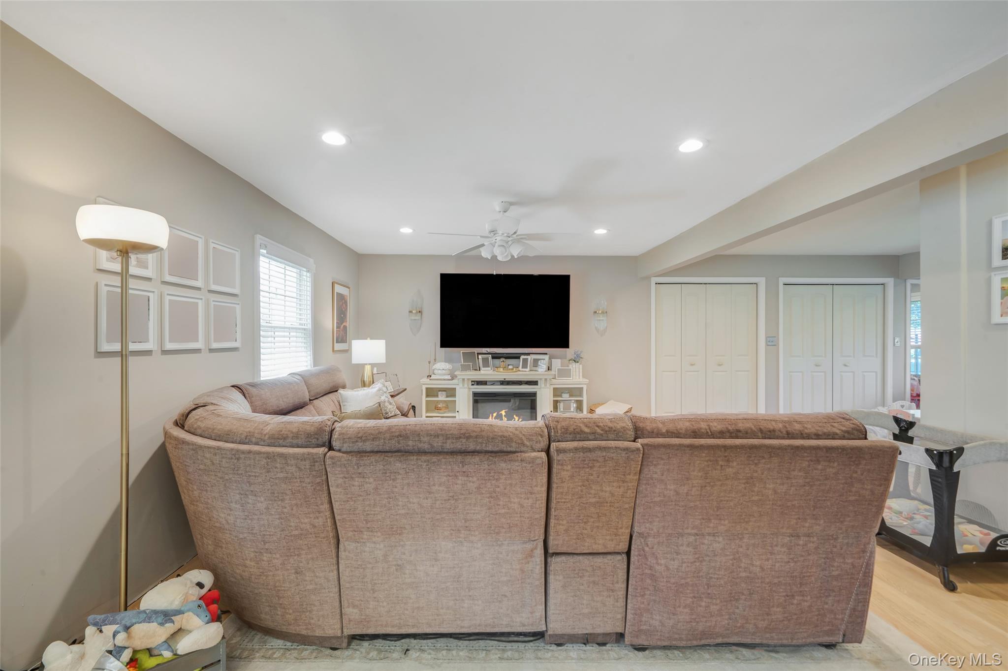 389 Yale Road Franklin Square, NY 11010 - Photo 15 of 43 a living room with furniture and a flat screen tv