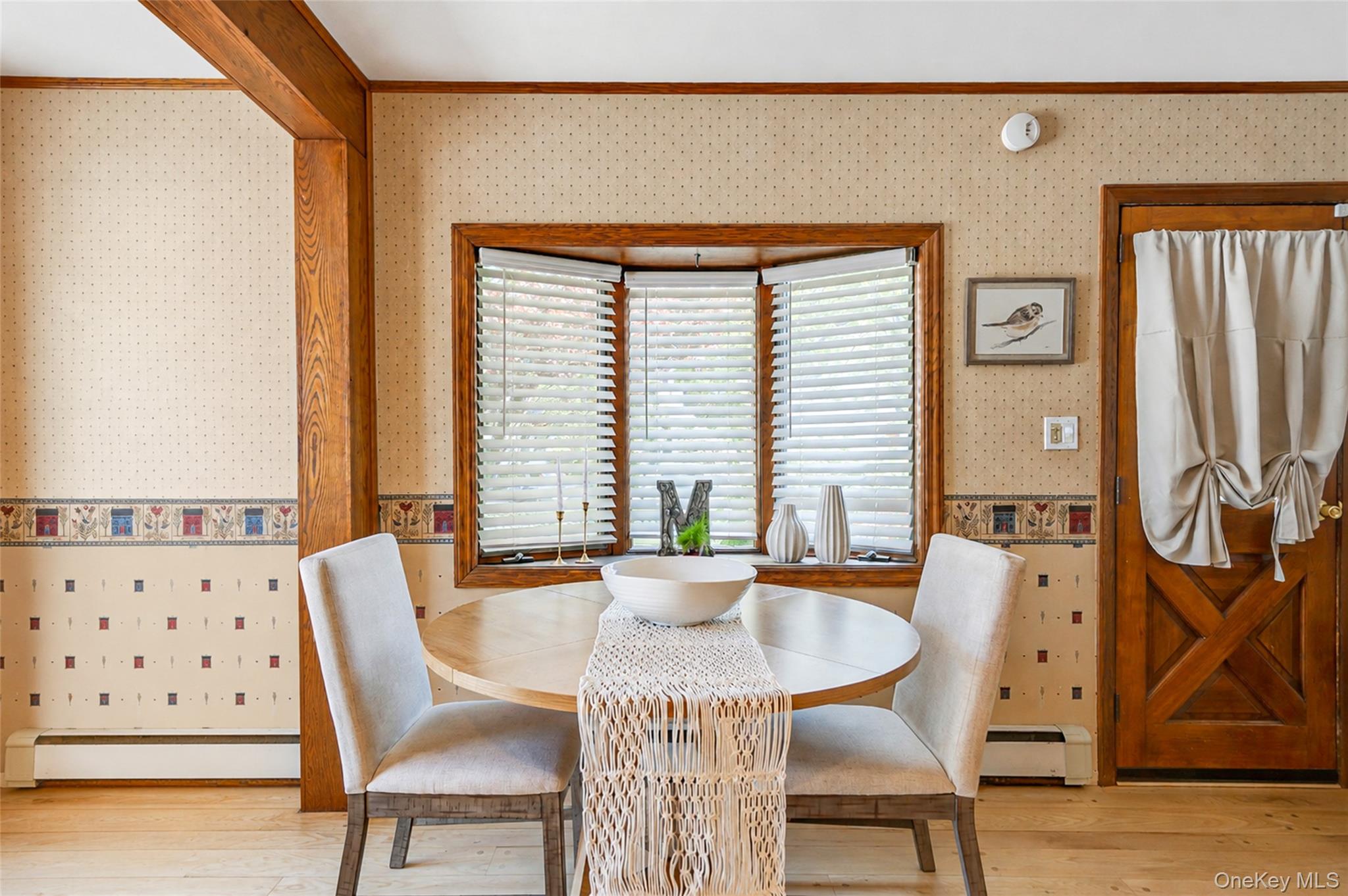 389 Yale Road Franklin Square, NY 11010 - Photo 20 of 43 a dining room with furniture and wooden floor
