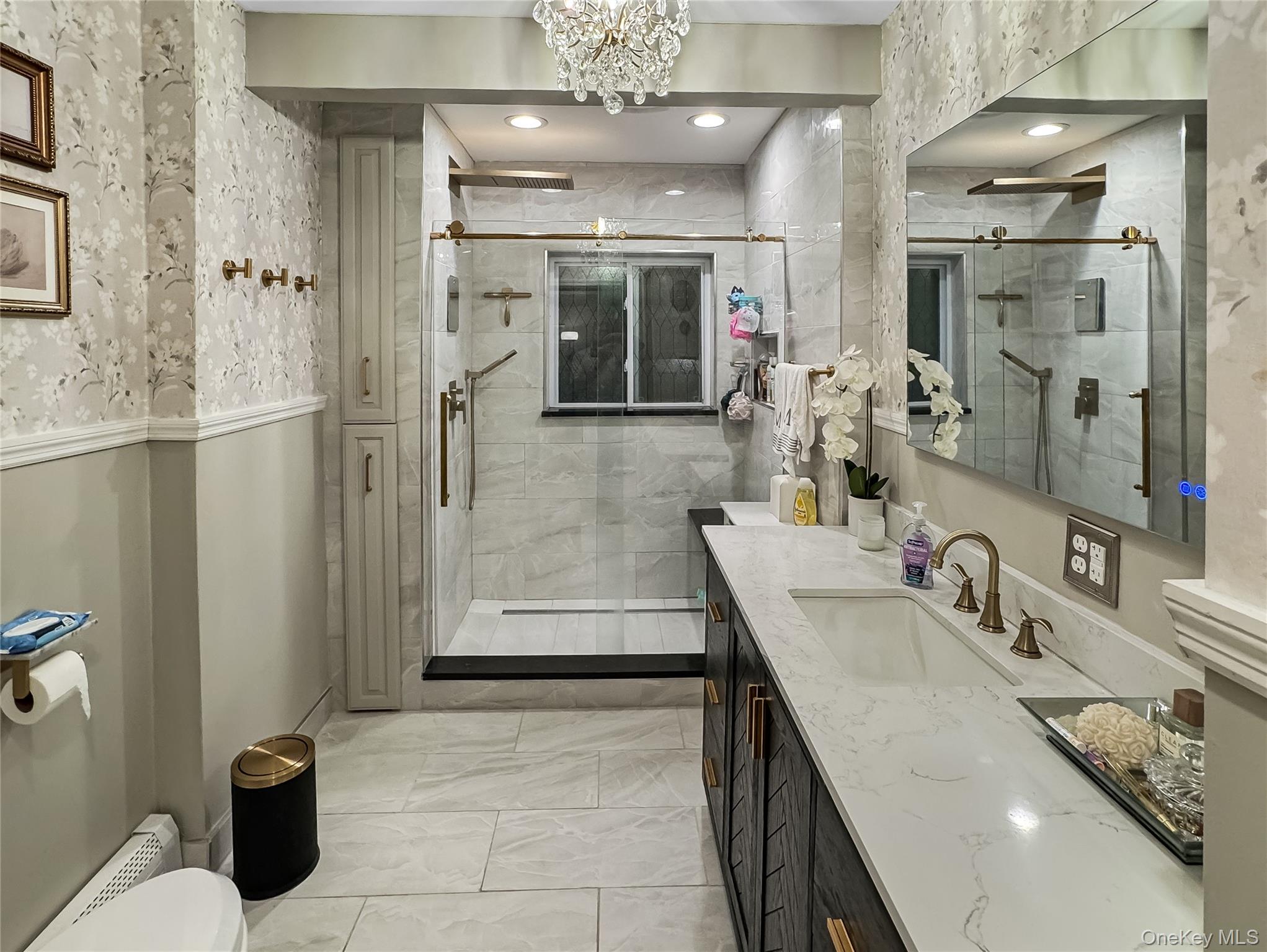389 Yale Road Franklin Square, NY 11010 - Photo 2 of 43 a bathroom with a sink a toilet and shower