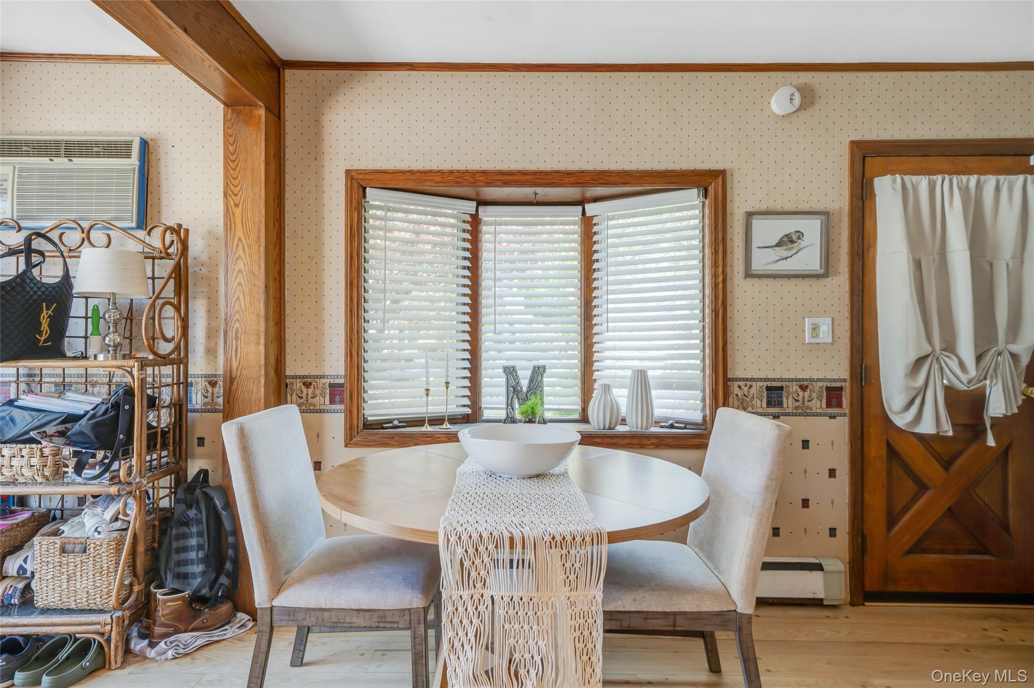 389 Yale Road Franklin Square, NY 11010 - Photo 22 of 43 a dining room with furniture and wooden floor