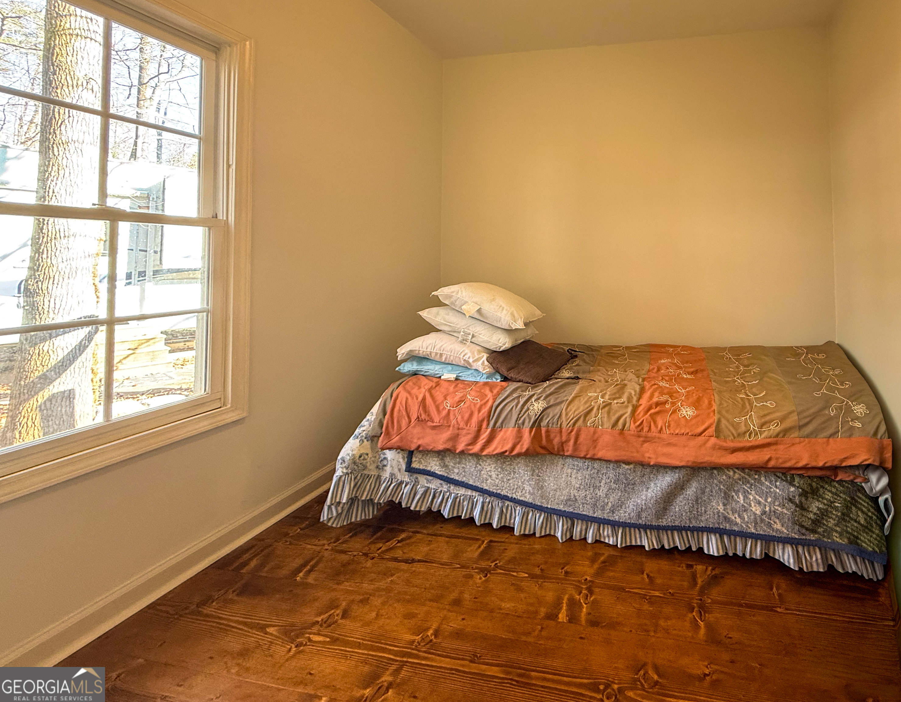 98 Canyon Pass Cleveland, GA 30528 - Photo 11 of 33 a bedroom with a bed and a window