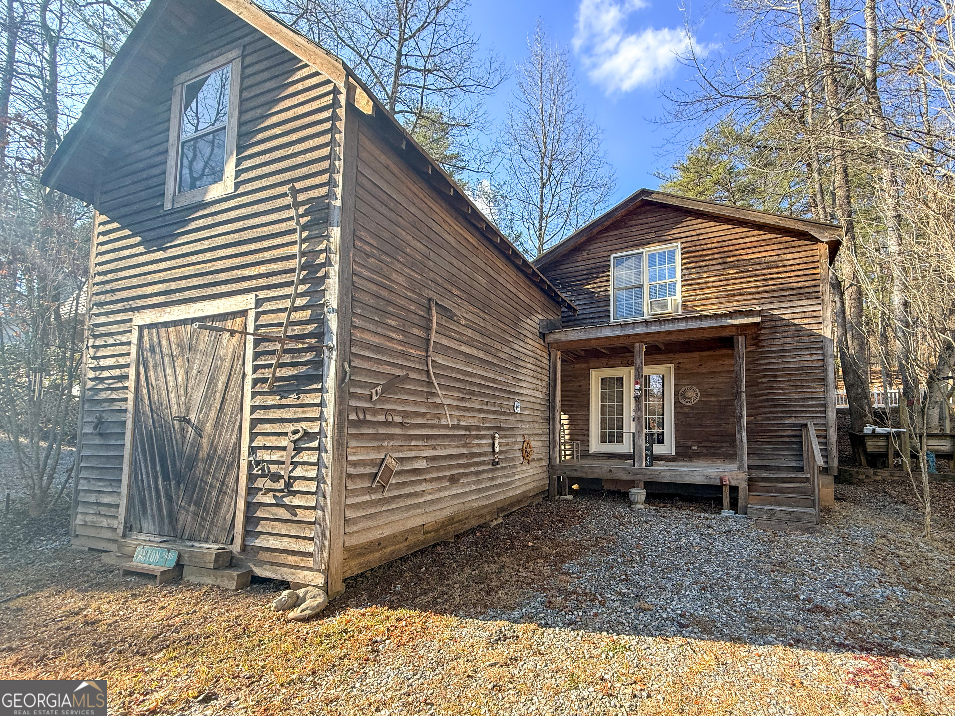 98 Canyon Pass Cleveland, GA 30528 - Photo 2 of 33 a view of a house with backyard and wooden fence