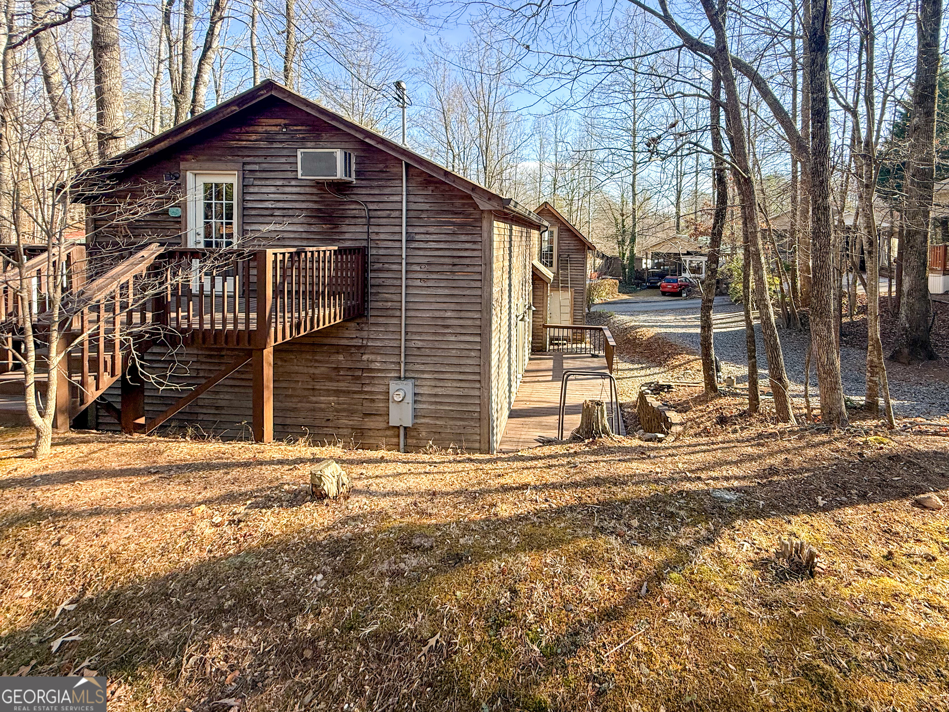 98 Canyon Pass Cleveland, GA 30528 - Photo 27 of 33 a front view of a house with a yard