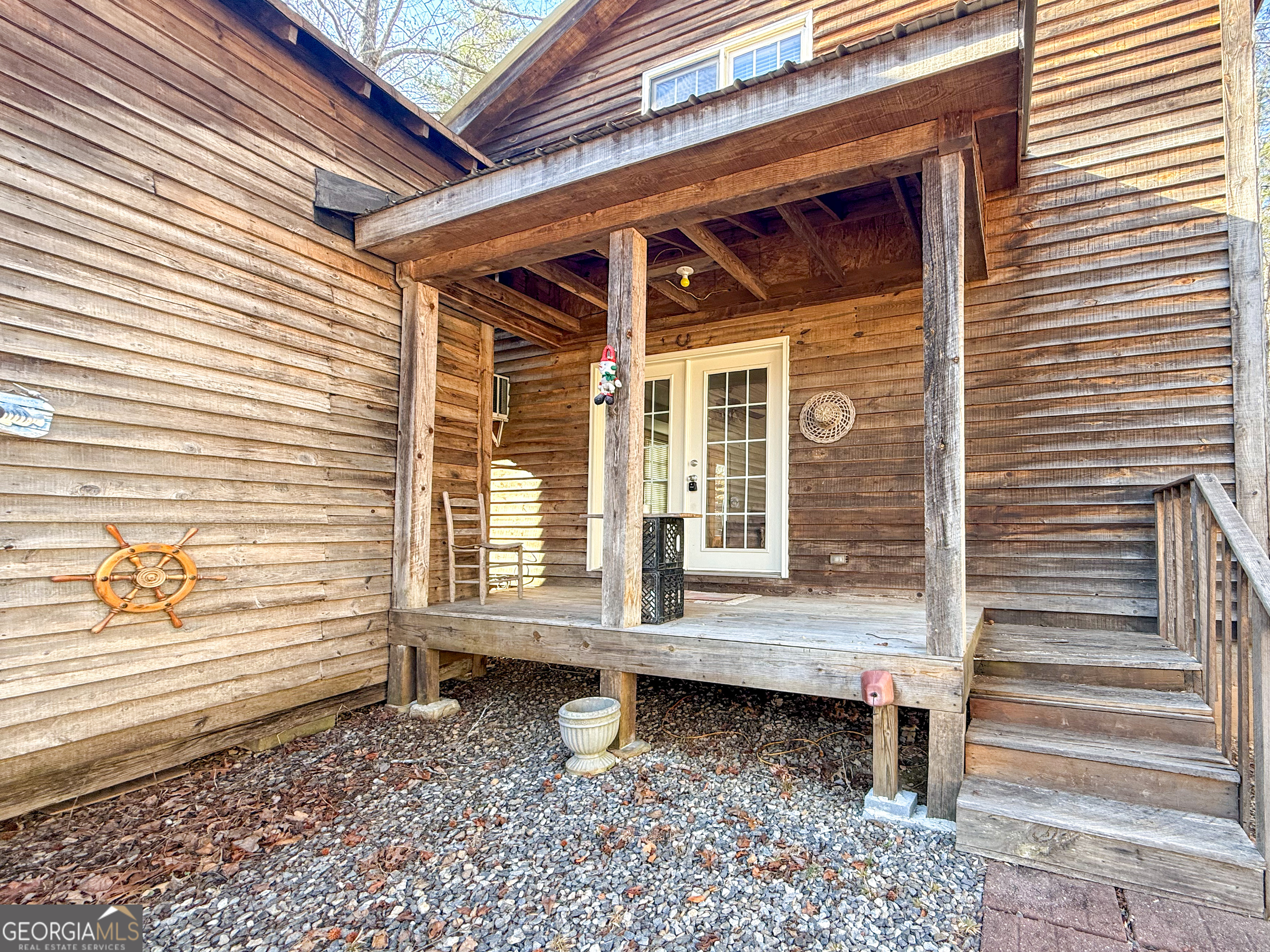 98 Canyon Pass Cleveland, GA 30528 - Photo 3 of 33 a backyard of a house with a large window