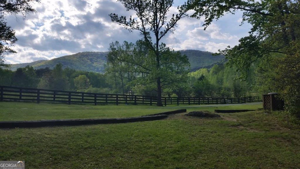 98 Canyon Pass Cleveland, GA 30528 - Photo 33 of 33 a view of a golf course with a lake