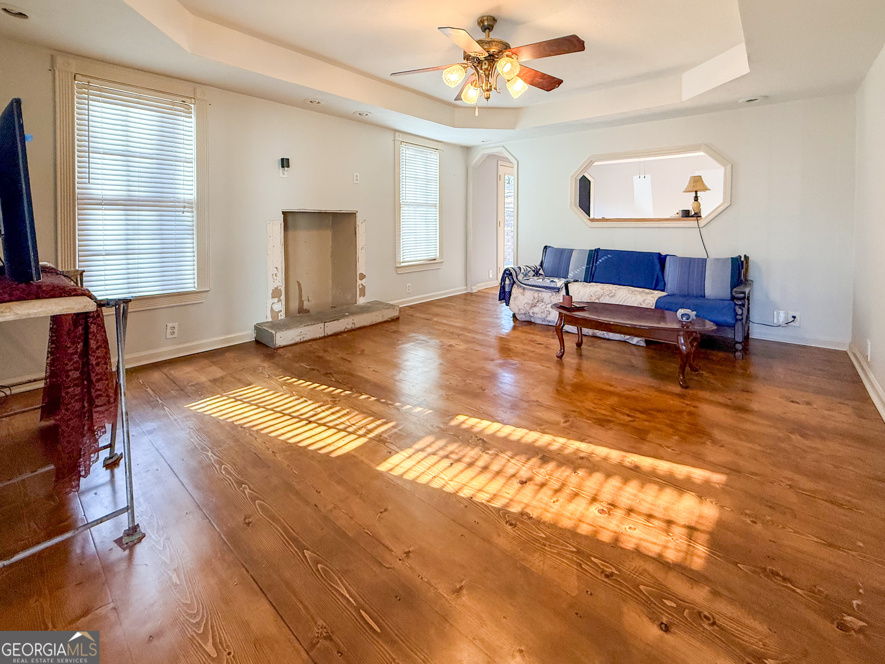 98 Canyon Pass Cleveland, GA 30528 - Photo 5 of 33 a living room with furniture and a wooden floor
