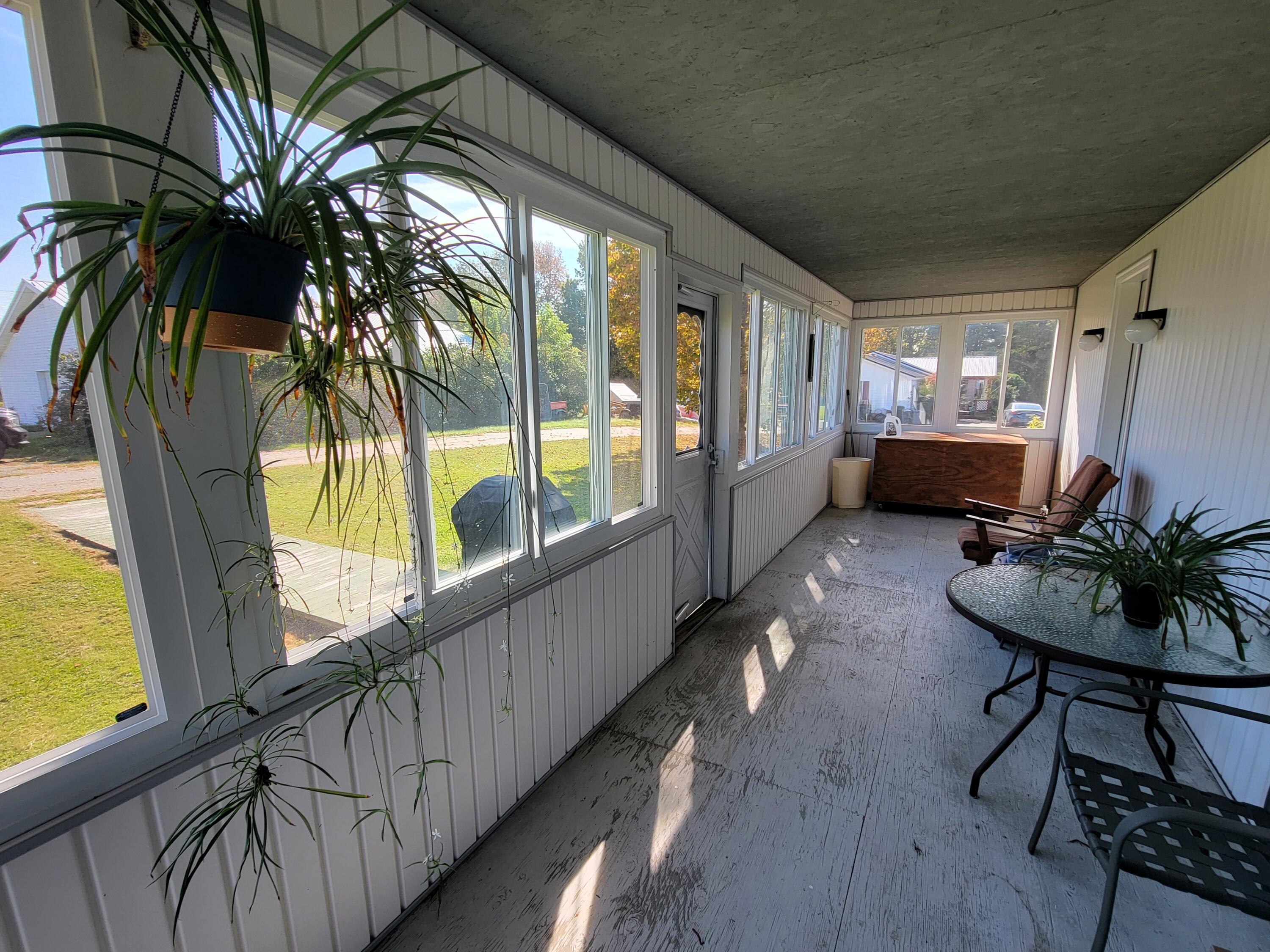 572 Albion Road Unity, ME 04988 - Photo 5 of 29 Glazed-In Porch