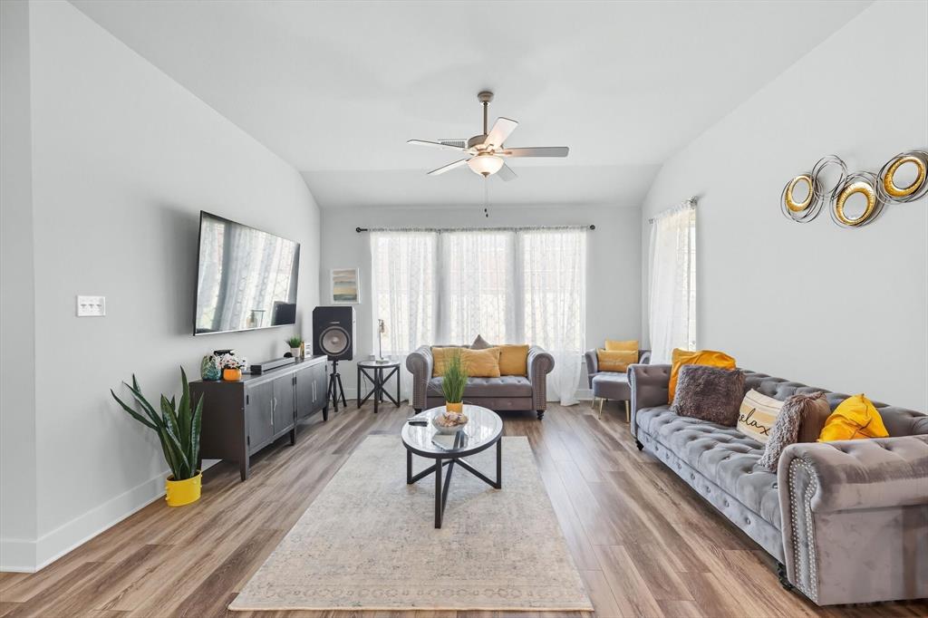2470 Pebble Bank Lane Midlothian, TX 76065 - Photo 7 of 33 a living room with furniture and wooden floor