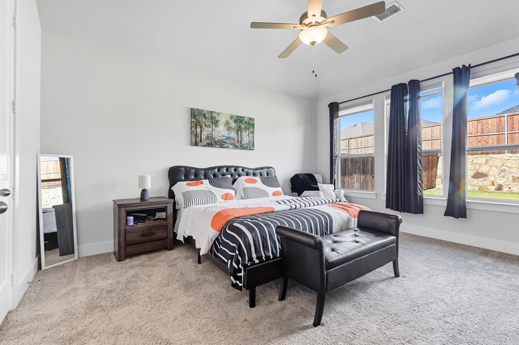 2470 Pebble Bank Lane Midlothian, TX 76065 - Photo 9 of 33 a bedroom with bed and a window