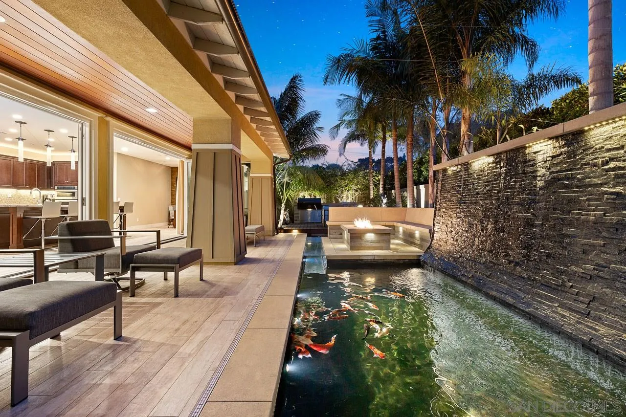 207 Stonesteps Way Encinitas, CA 92024 - Photo 2 of 34 a view of a patio with swimming pool table and chairs