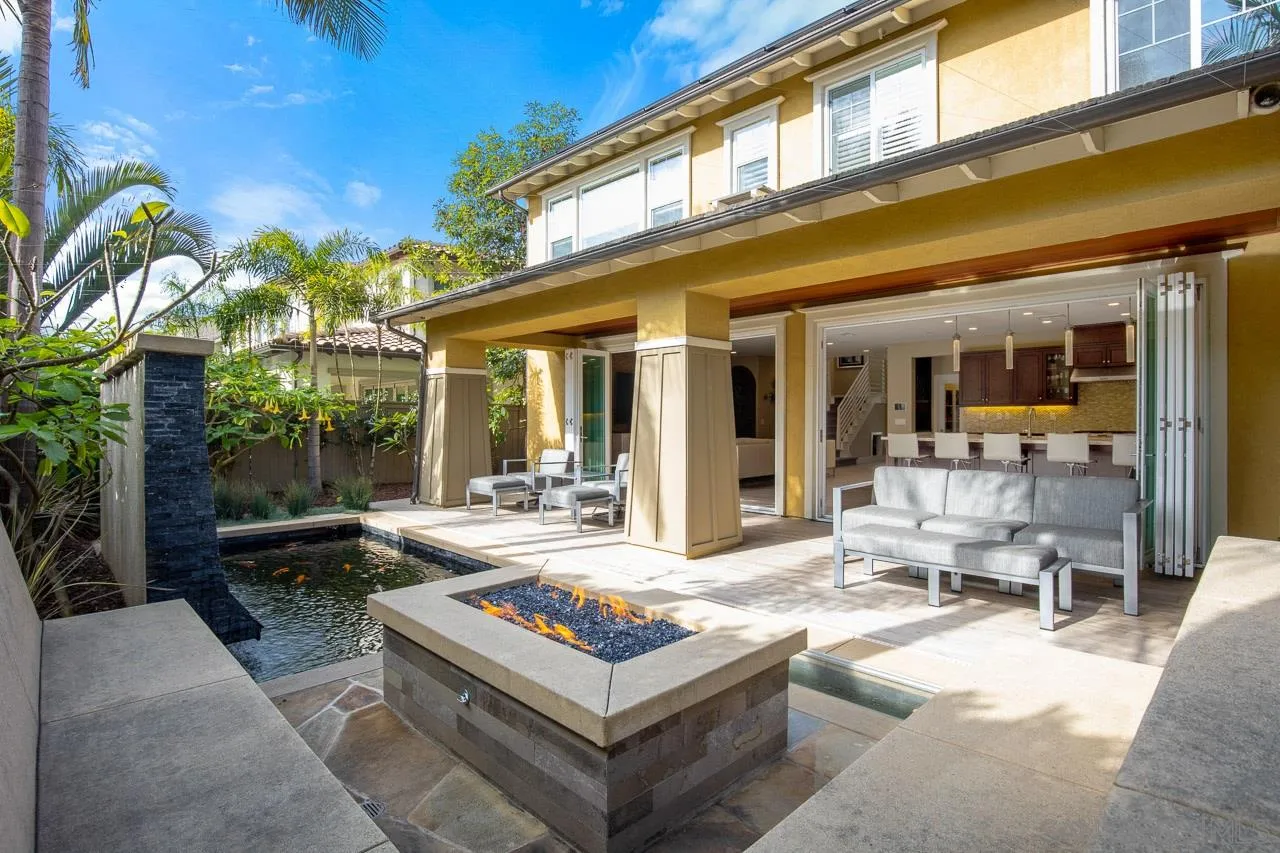 207 Stonesteps Way Encinitas, CA 92024 - Photo 24 of 34 a house view with a sitting space fire pit and outdoor space