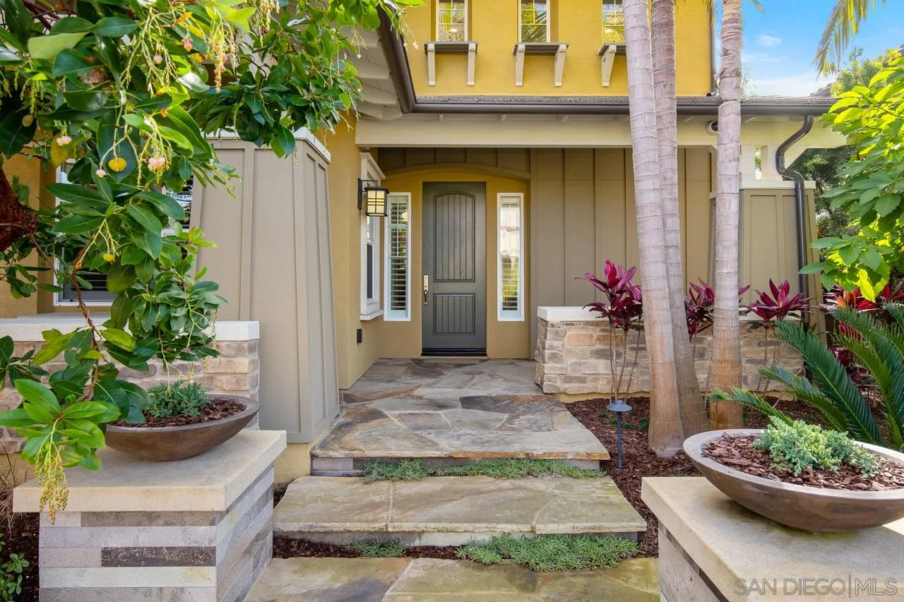 207 Stonesteps Way Encinitas, CA 92024 - Photo 28 of 34 a view of a porch with a potted plant