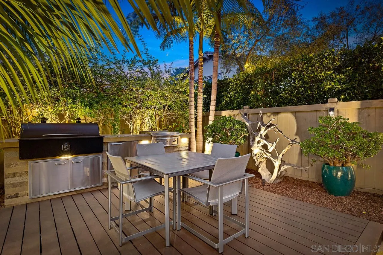207 Stonesteps Way Encinitas, CA 92024 - Photo 3 of 34 a view of a chairs and table in the patio