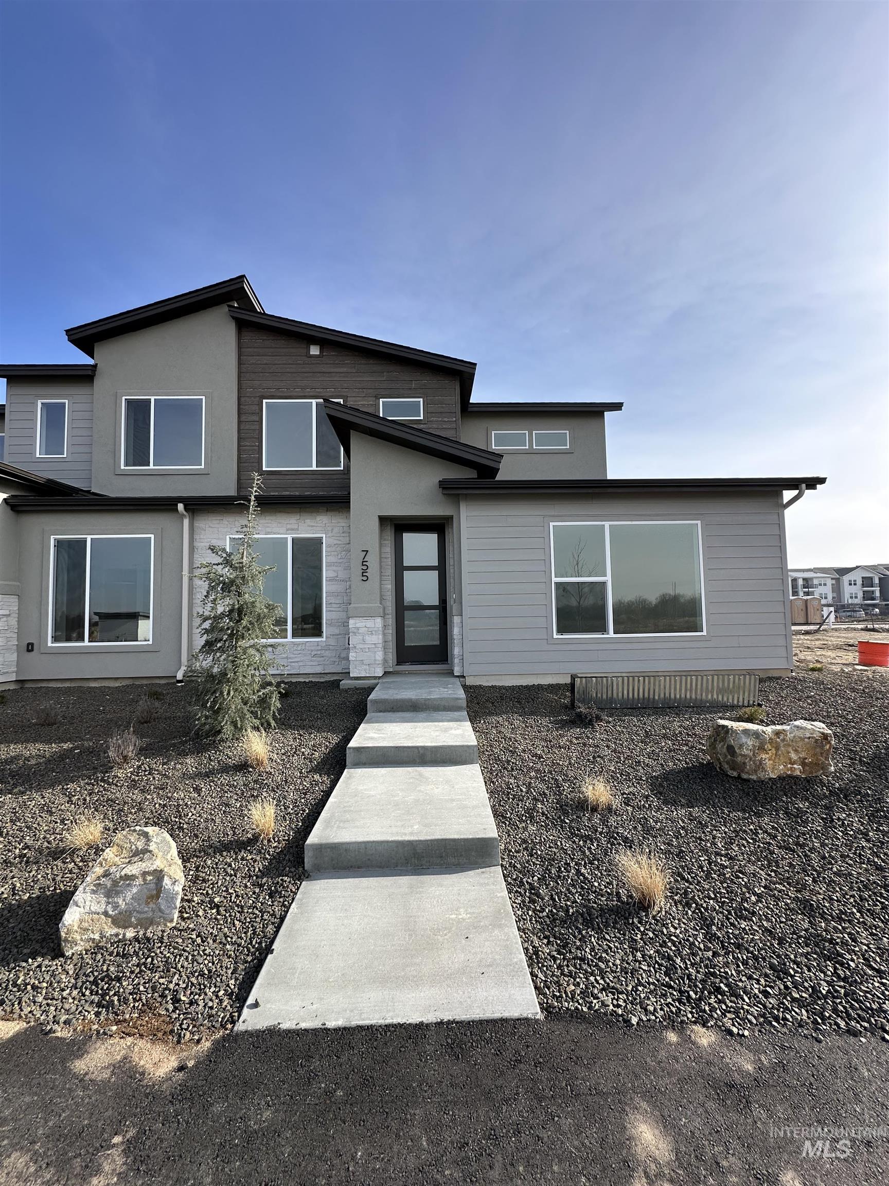 755 South Calhoun Lane Star, ID 83669 - Photo 2 of 4 View of front facade with stucco siding