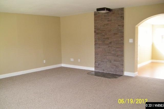1963 Bishop Street Reno, NV 89512 - Photo 4 of 12 an empty room with windows