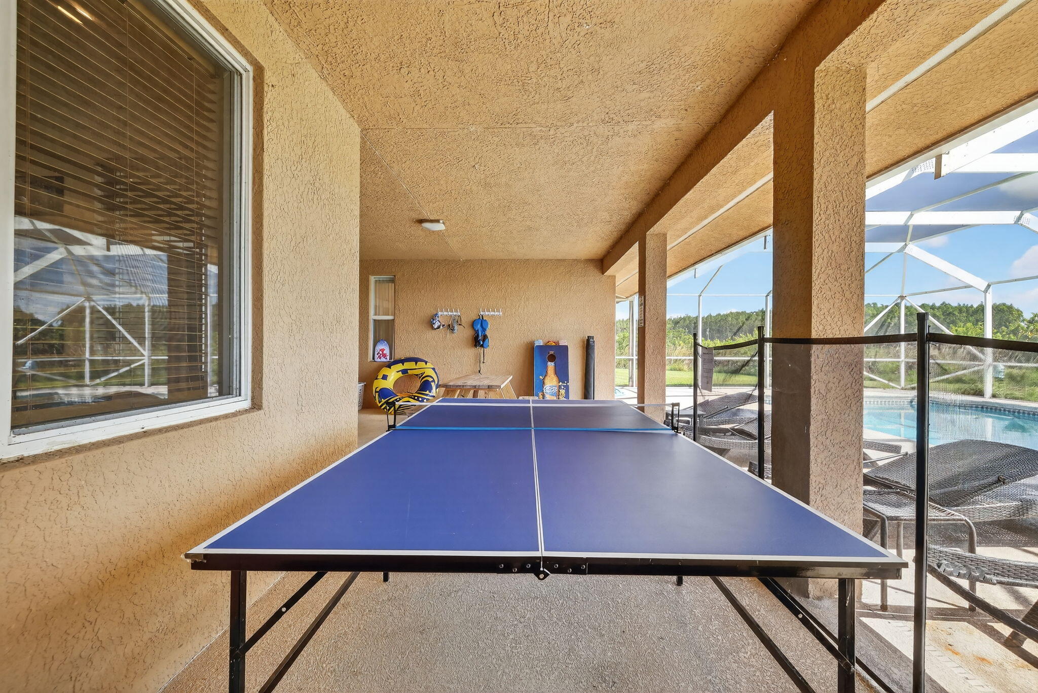 2700 South Header Canal Road Fort Pierce, FL 34945 - Photo 25 of 45 a view of a dining room with furniture and window