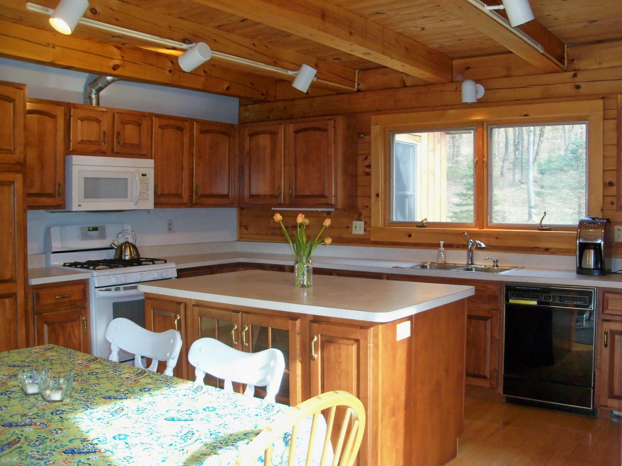 134 Cross Place Road Washington, MA 01223 - Photo 3 of 31 a kitchen with stainless steel appliances granite countertop a sink a stove and a microwave