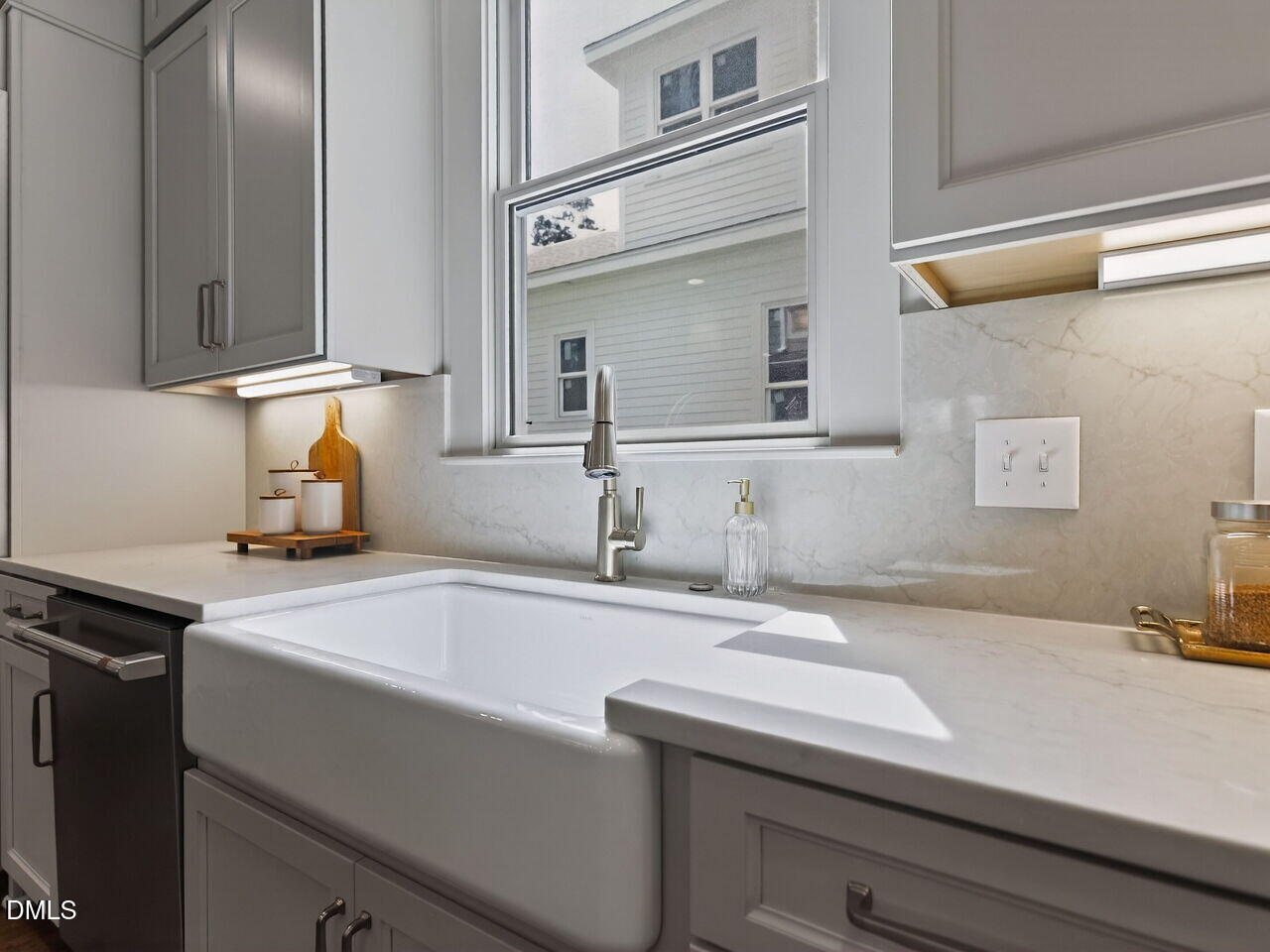 504 Tilden Street Raleigh, NC 27605 - Photo 28 of 58 a bathroom with a sink and a mirror