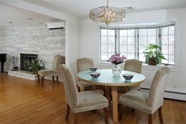 27 Battle Green Road Lexington, MA 02421 - Photo 3 of 7 a dining room with furniture a chandelier and wooden floor