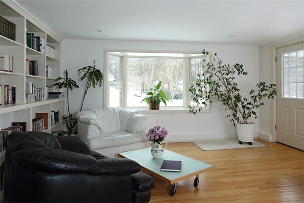 27 Battle Green Road Lexington, MA 02421 - Photo 5 of 7 a living room with furniture potted plant and a large window