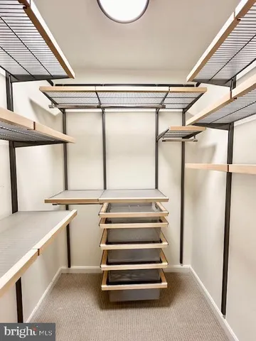 a bathroom with a sink vanity granite and a mirror