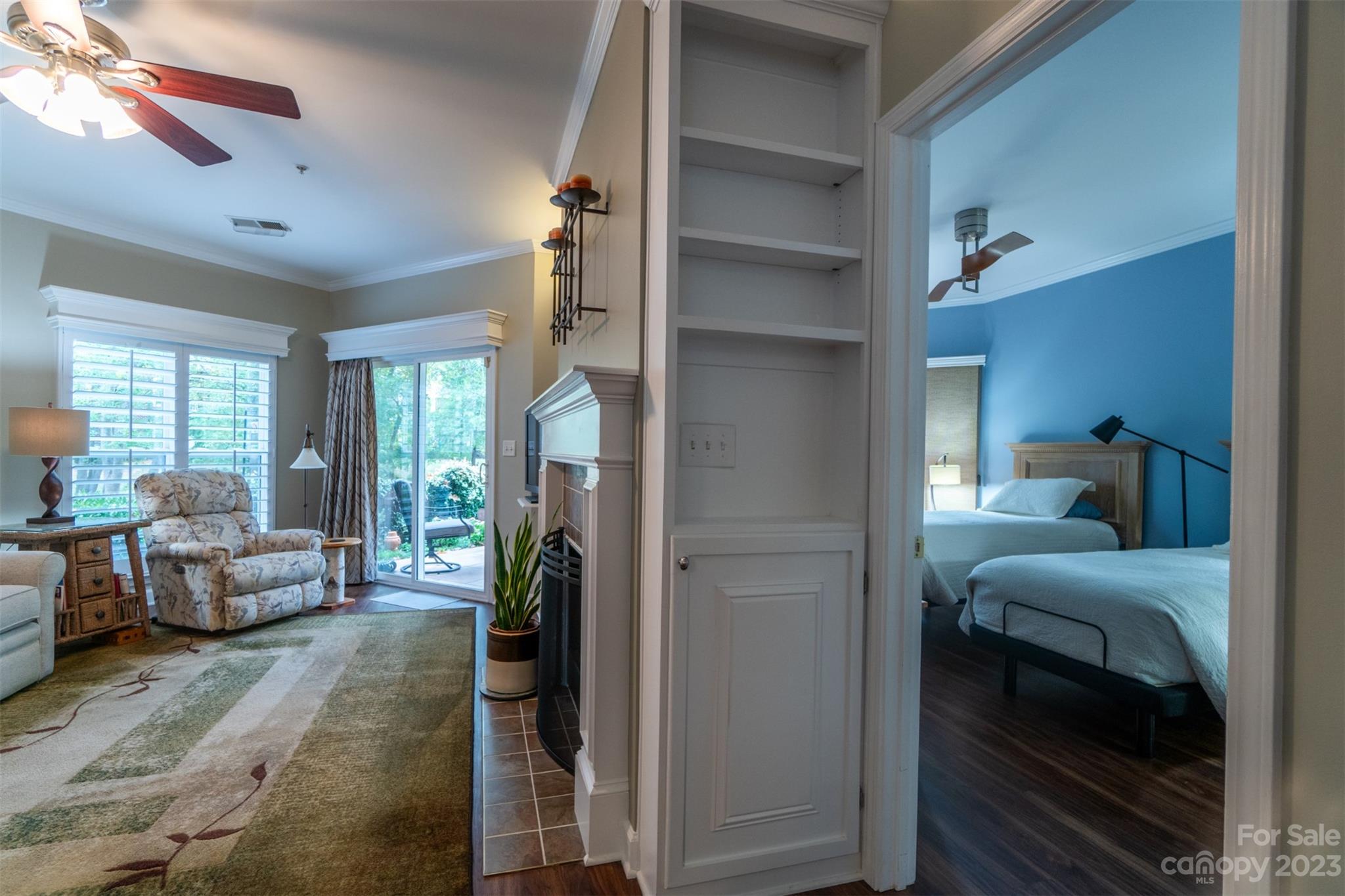 737 Peninsula Drive Davidson, NC 28036 - Photo 11 of 34 a bedroom with furniture and a balcony