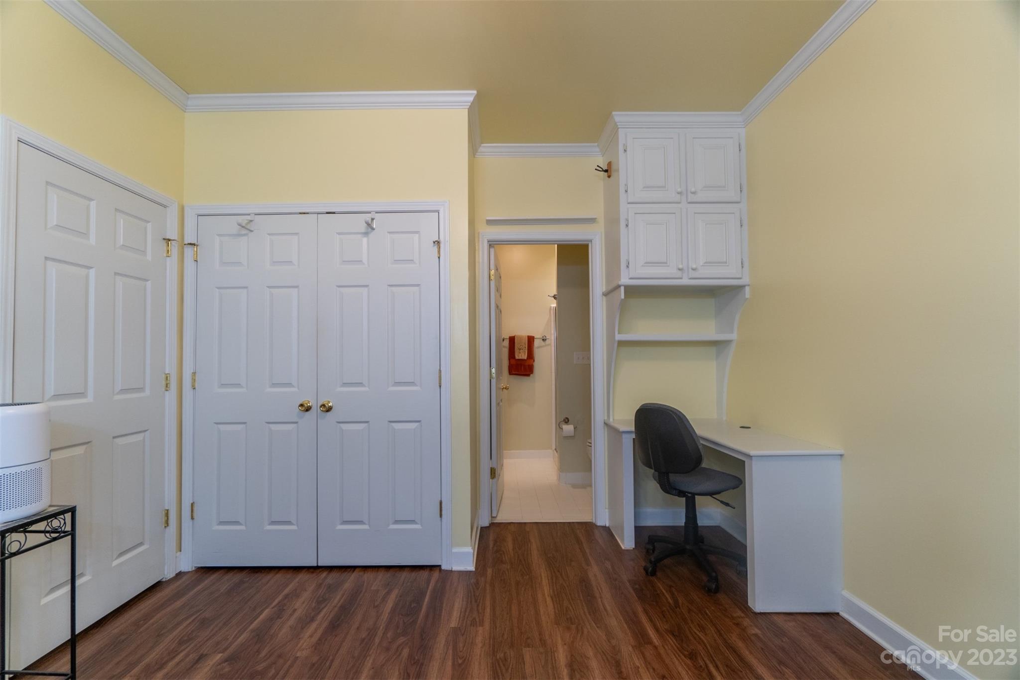 737 Peninsula Drive Davidson, NC 28036 - Photo 25 of 34 a view of room with wooden floor and cabinet