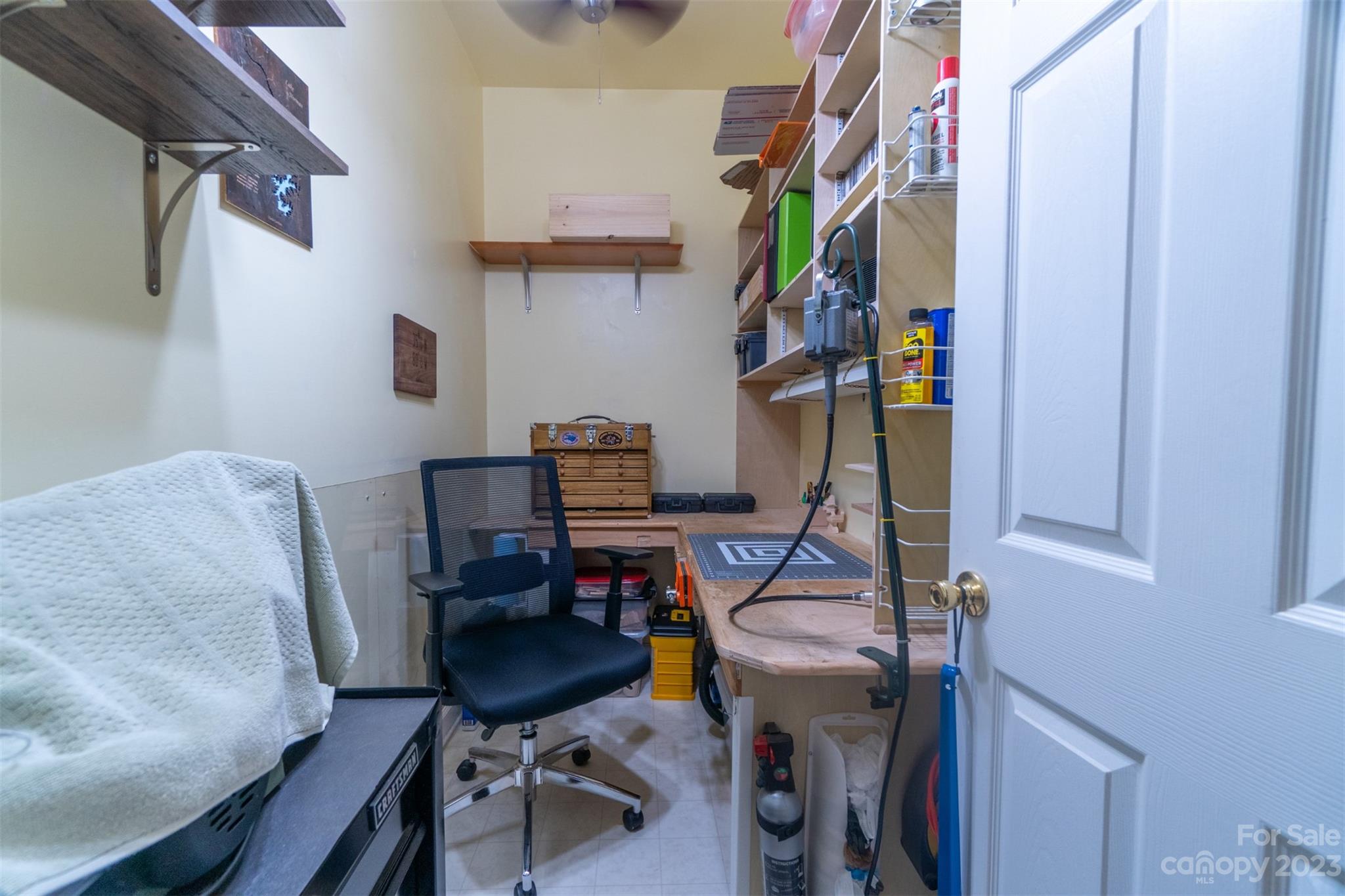 737 Peninsula Drive Davidson, NC 28036 - Photo 27 of 34 a view of a workspace with furniture and a window