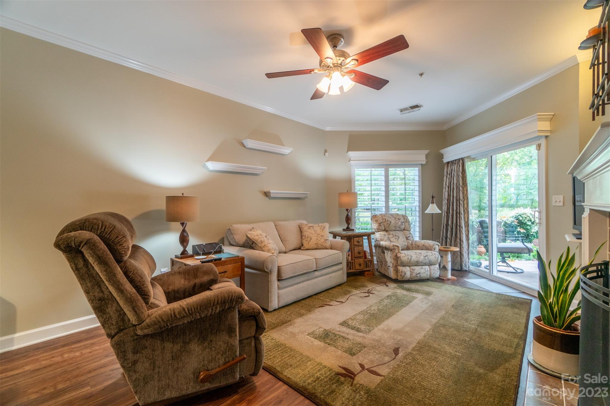 737 Peninsula Drive Davidson, NC 28036 - Photo 8 of 34 a living room with furniture and a large window