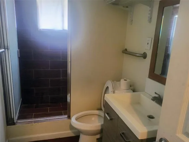 a bathroom with a sink and a toilet
