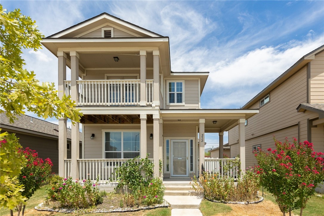 232 Cane River Road Pflugerville, TX 78660 - Photo 1 of 1 front view of a house with a yard