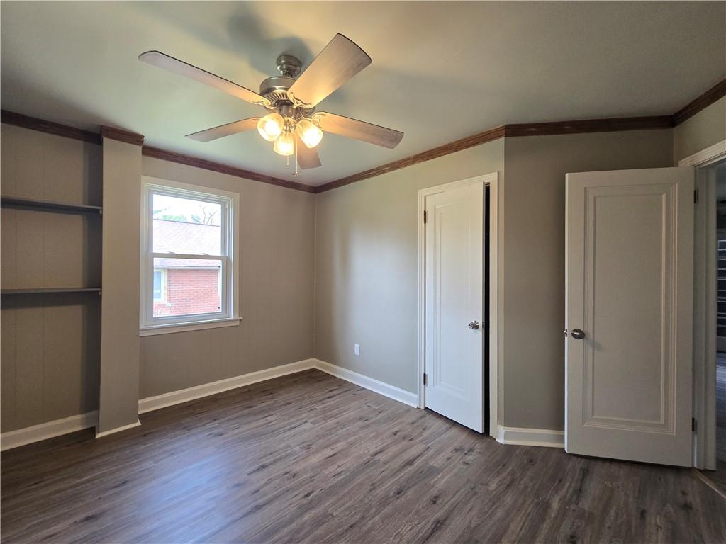 1425 Barclay Hill Road Beaver, PA 15009 - Photo 12 of 30 an empty room with wooden floor fan and windows