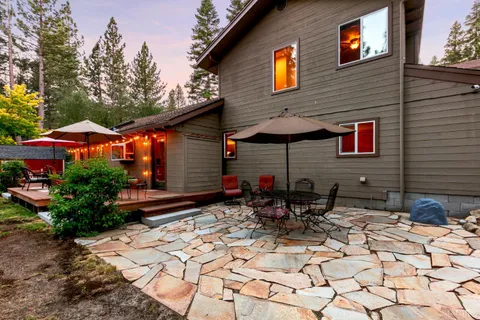 a view of house with yard