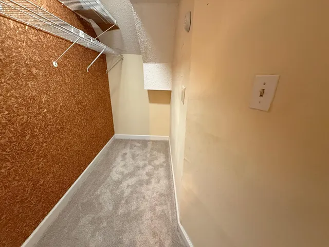 a view of swimming pool with a patio