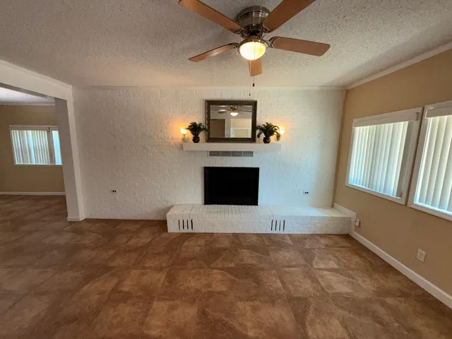 a view of an empty room and window