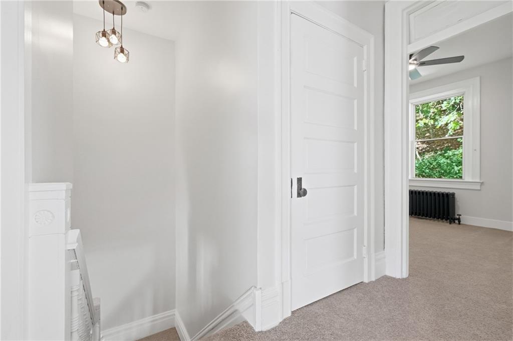 848 Grand Avenue Pittsburgh, PA 15212 - Photo 17 of 33 a view of a hallway to rooms