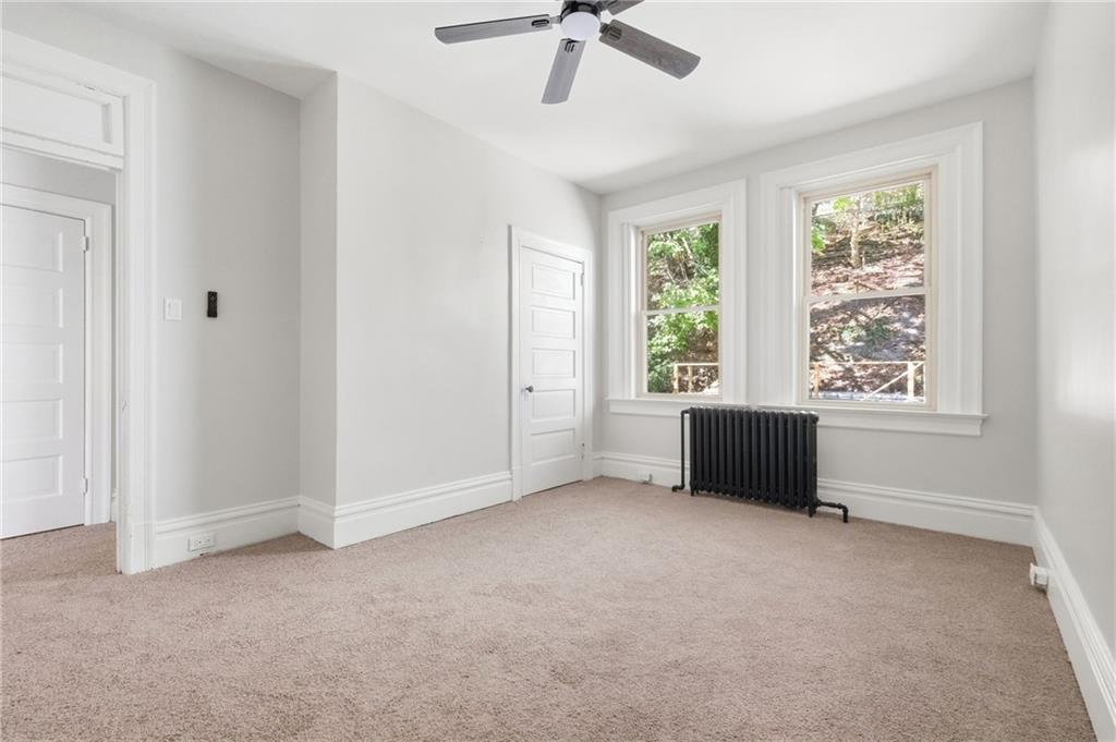848 Grand Avenue Pittsburgh, PA 15212 - Photo 23 of 33 a view of an empty room with a window