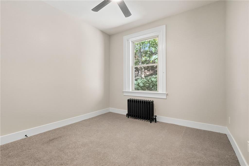 848 Grand Avenue Pittsburgh, PA 15212 - Photo 24 of 33 an empty room with windows