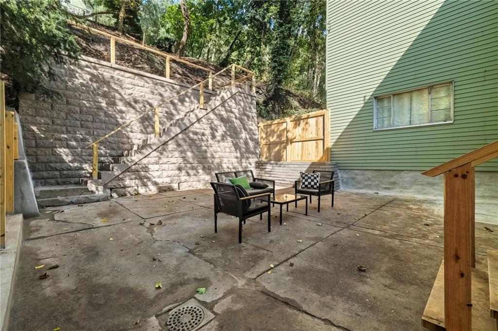 848 Grand Avenue Pittsburgh, PA 15212 - Photo 27 of 33 a backyard of a house with table and chairs