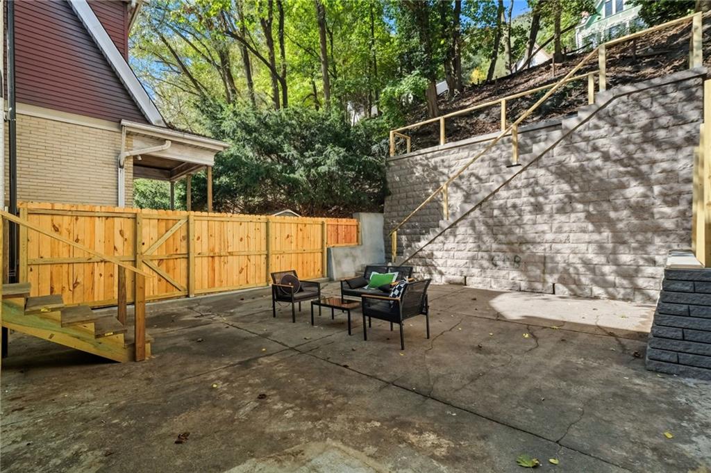 848 Grand Avenue Pittsburgh, PA 15212 - Photo 28 of 33 a view of a patio with table and chairs and potted plants