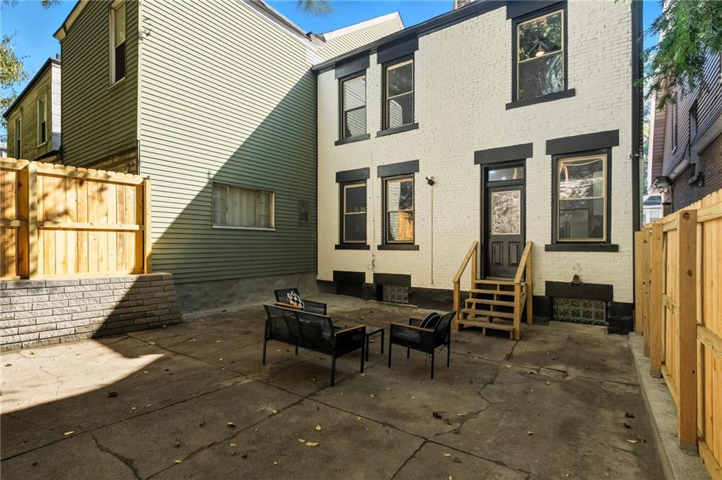 848 Grand Avenue Pittsburgh, PA 15212 - Photo 29 of 33 a backyard of a house with seating space