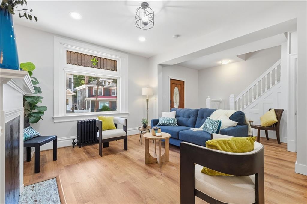 848 Grand Avenue Pittsburgh, PA 15212 - Photo 9 of 33 a living room with furniture and a potted plant