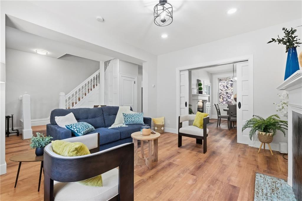 848 Grand Avenue Pittsburgh, PA 15212 - Photo 10 of 33 a living room with furniture and a wooden floor