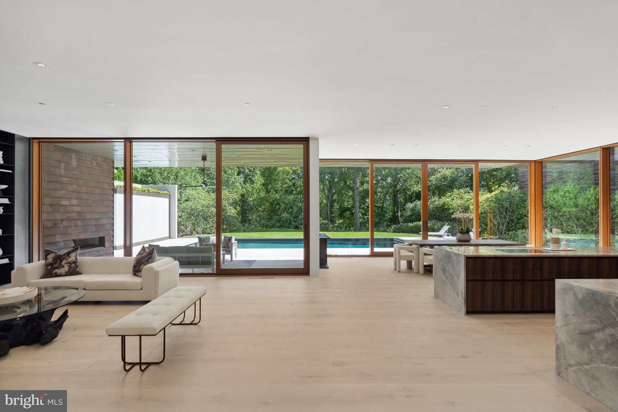 3131 Chain Bridge Road Northwest Washington, DC 20016 - Photo 11 of 54 a living room with furniture and a large window