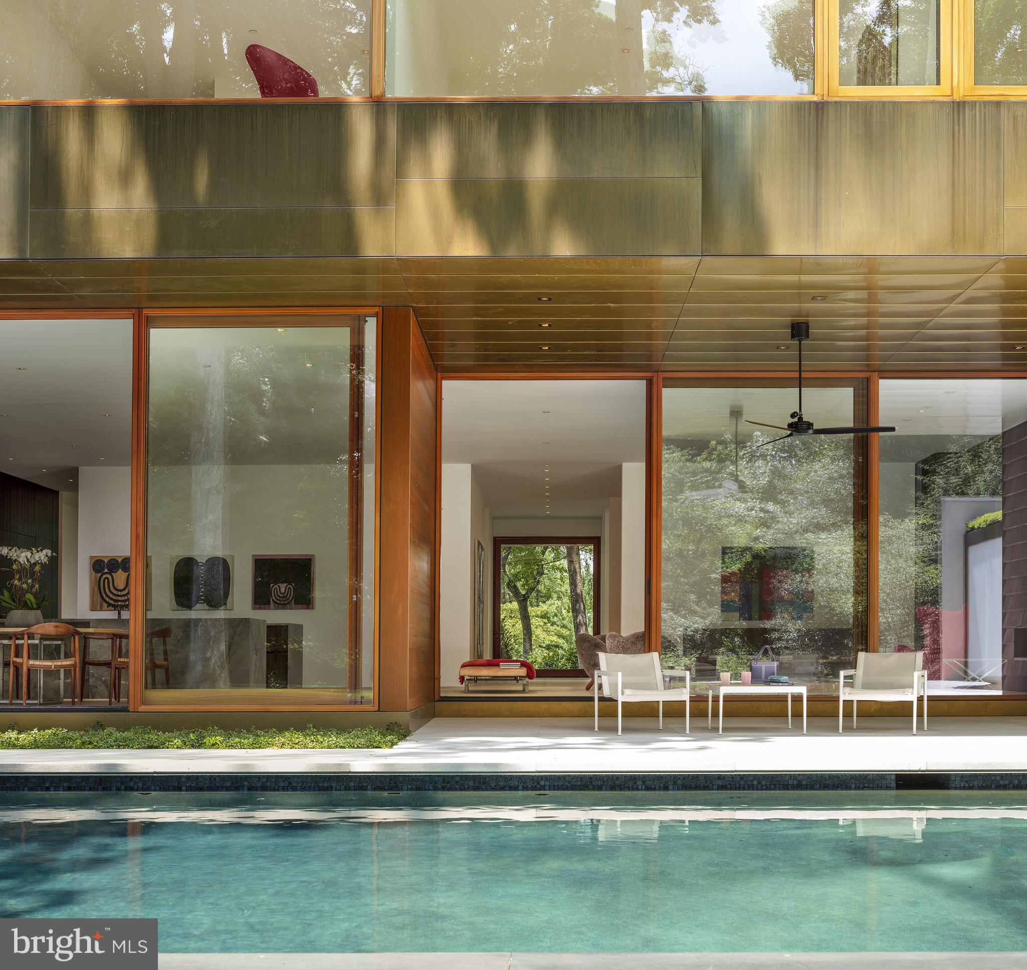 3131 Chain Bridge Road Northwest Washington, DC 20016 - Photo 23 of 54 a house view with swimming pool and outdoor space