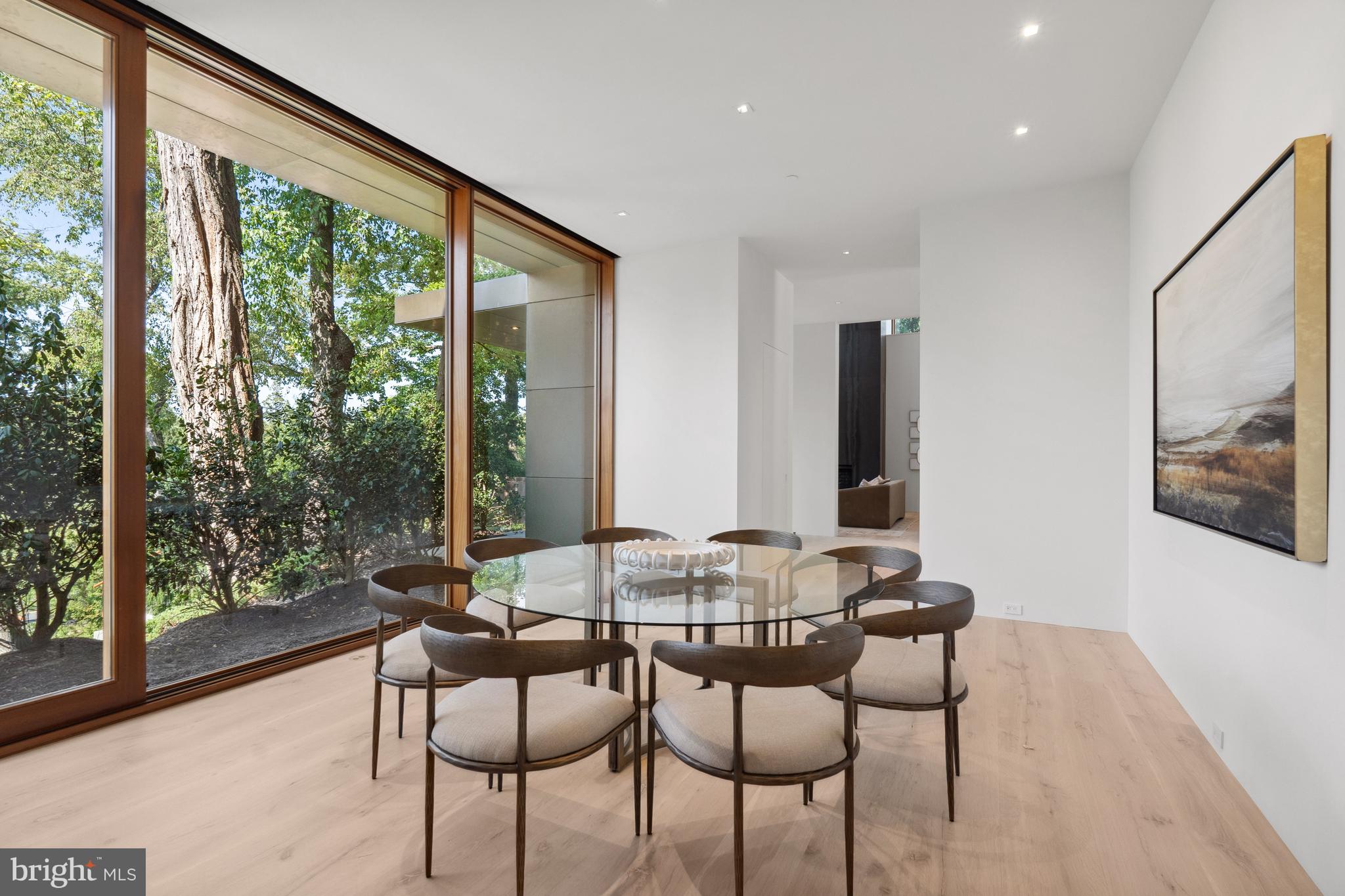 3131 Chain Bridge Road Northwest Washington, DC 20016 - Photo 28 of 54 a view of a dining room with furniture and window
